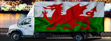 Truck with a Welsh flag on the side